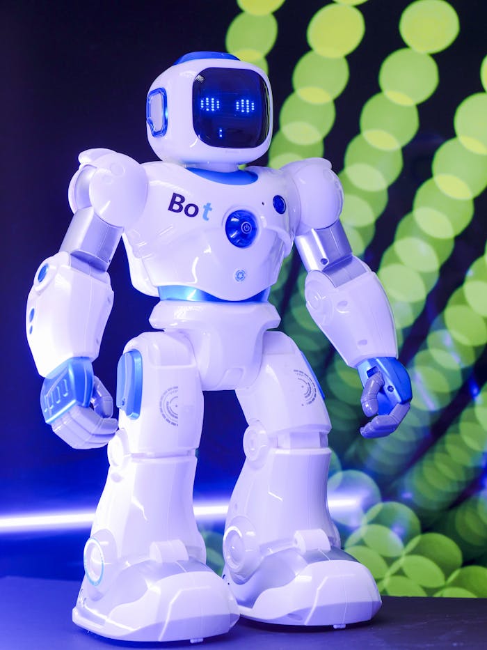 High-tech humanoid robot with glowing LED display and futuristic design.